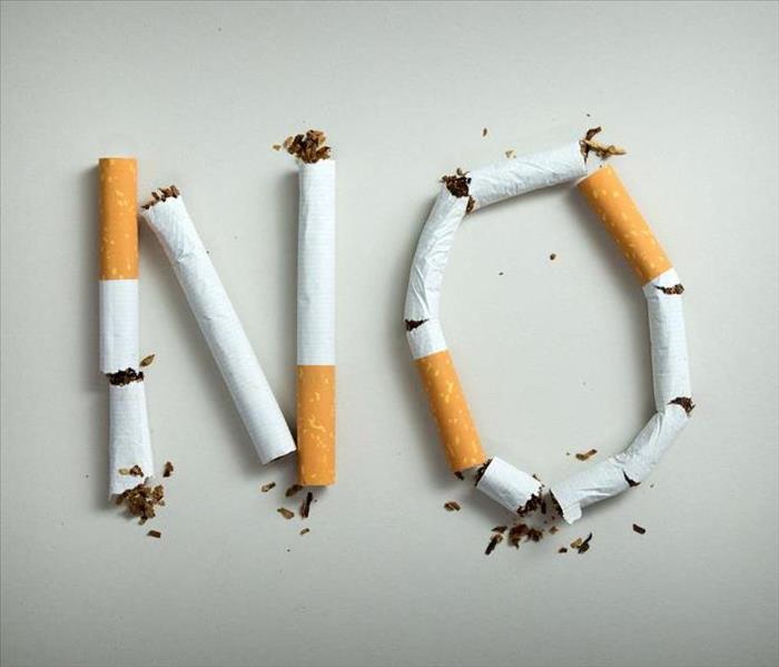 Used cigarettes spell out the word "NO"